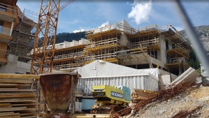 Roof carpenter preparing to top out in Haus A